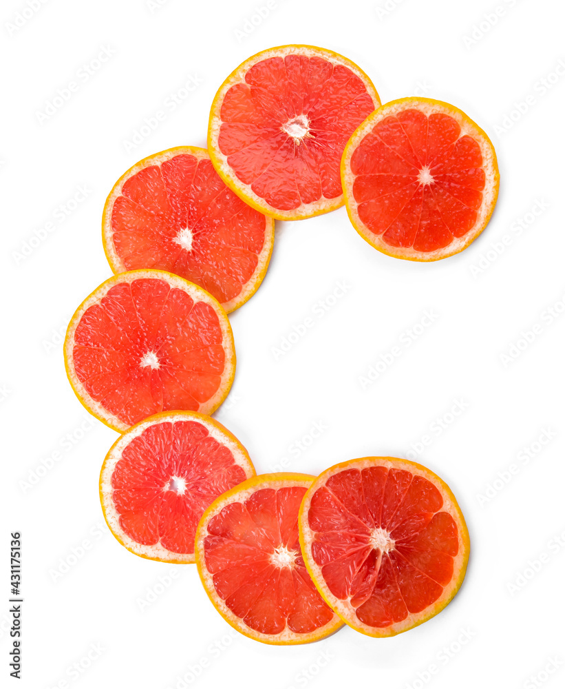 Letter C made of grapefruit slices on white background