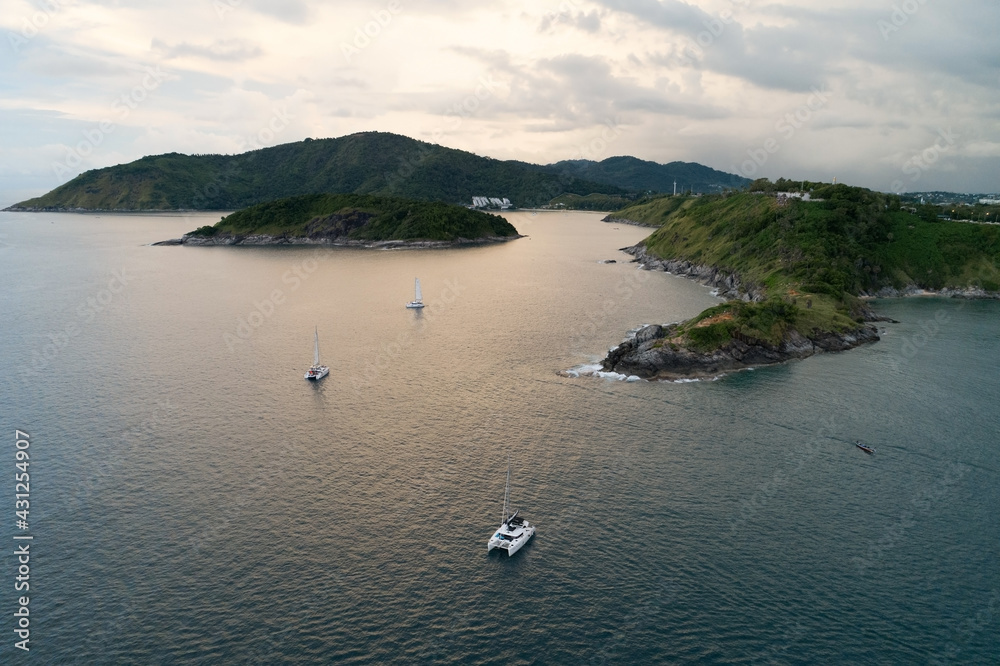 Sunset over sea with tourist boats sailboat to see Beautiful sunset sky Landscape nature view at Lae