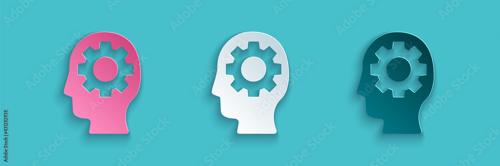 Paper cut Human head with gear inside icon isolated on blue background. Artificial intelligence. Thi