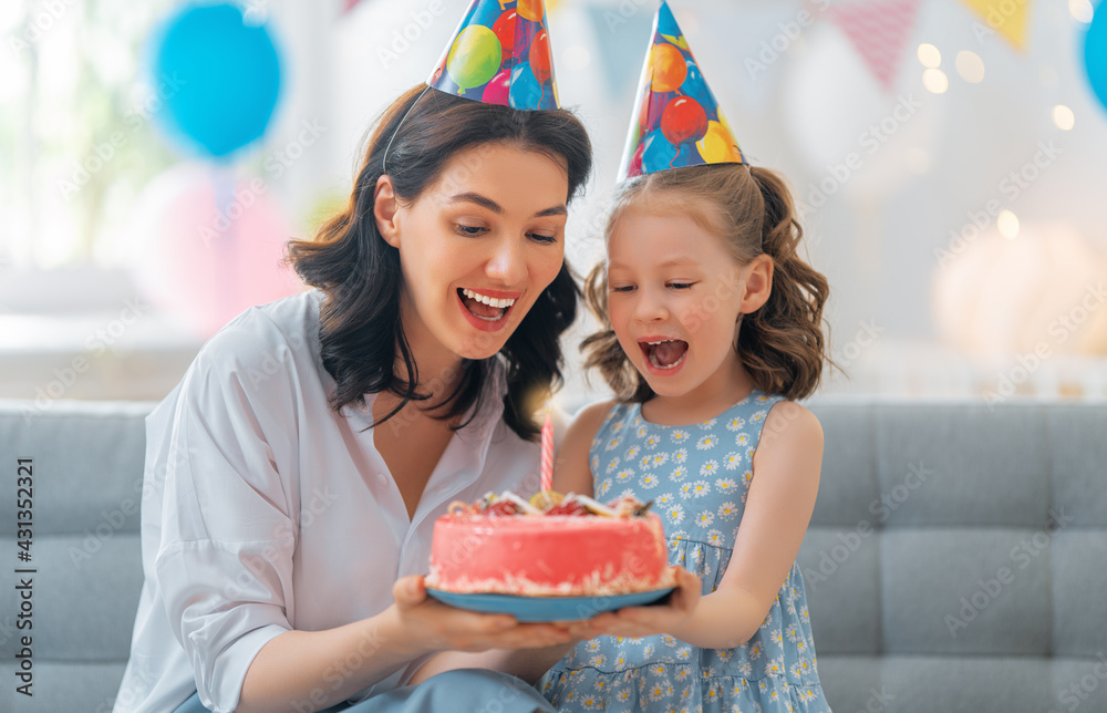 Mother and daughter are celebrating birthday.