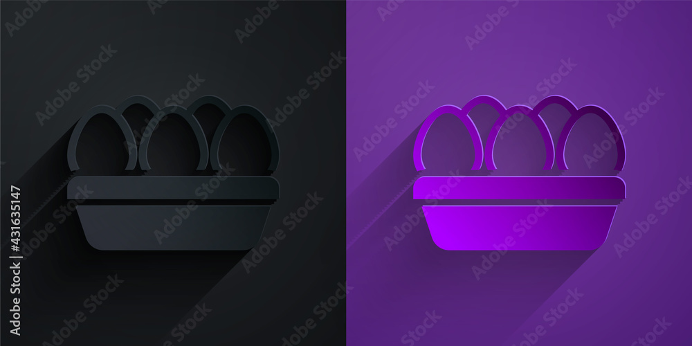 Paper cut Chicken egg in box icon isolated on black on purple background. Paper art style. Vector