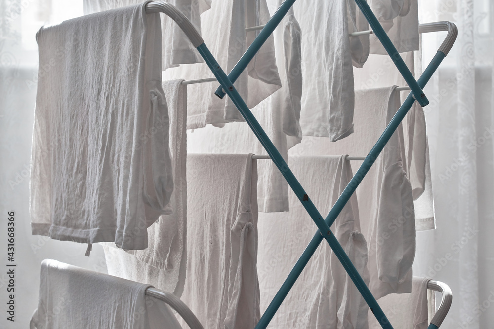 Close up of White Laundry hanging on a Clothes Airer