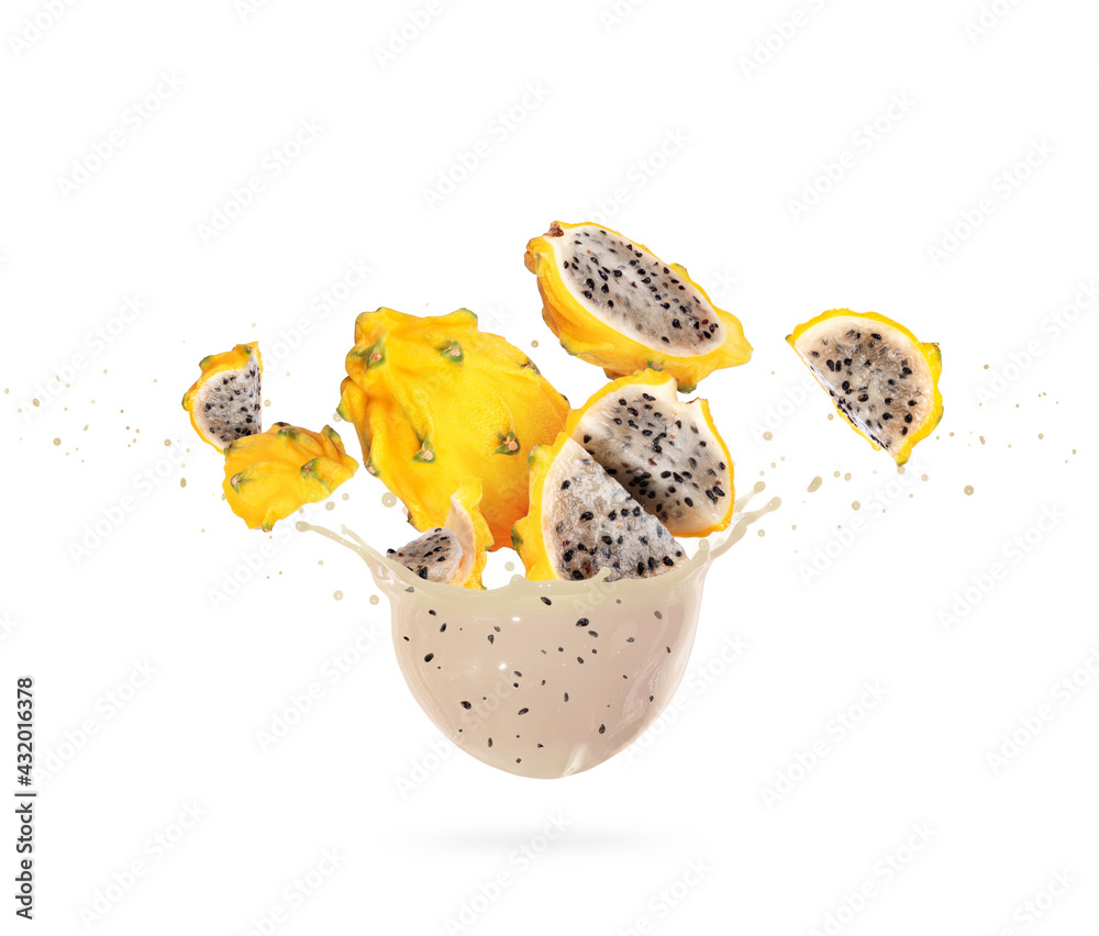 Sliced ripe yellow dragon fruits (pitahaya) with splashes of fresh juice, isolated on a white backgr