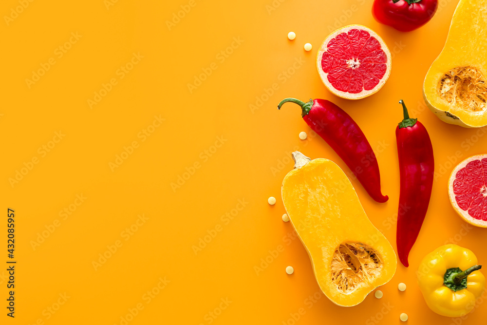 Healthy products with pills on color background