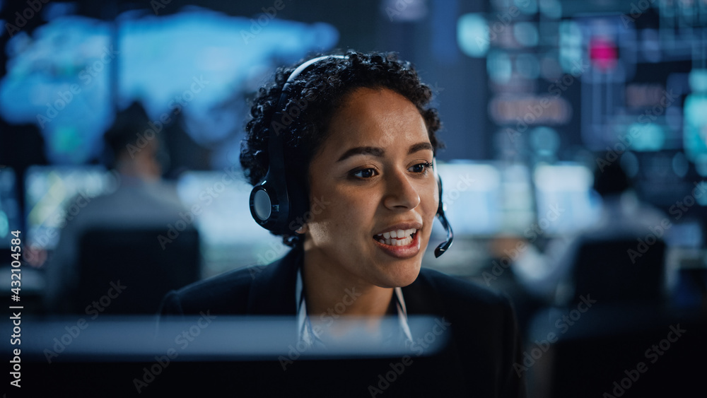 Portrait of Professional IT Technical Support Female Specialist Working on Computer in Monitoring Co