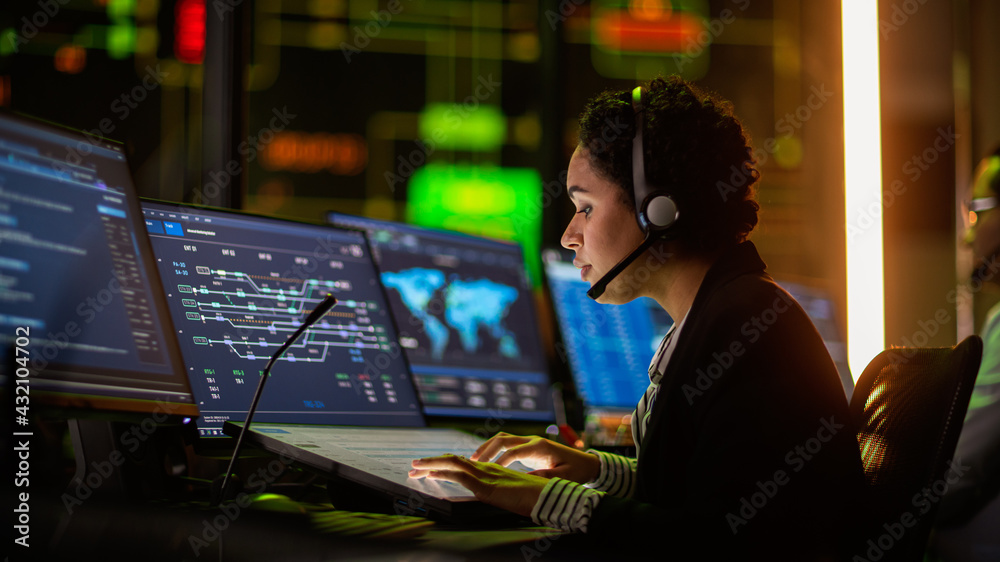 Portrait of Professional IT Technical Support Specialist Working on Computer in Monitoring Control R