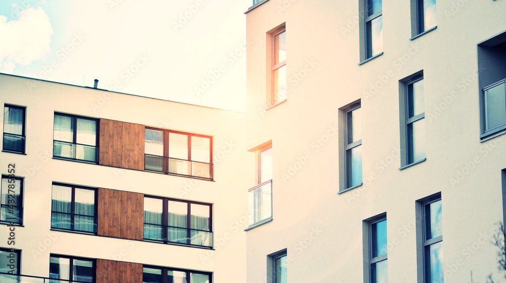 Apartment residential house and home facade architecture and outdoor facilities. Blue sky on the bac