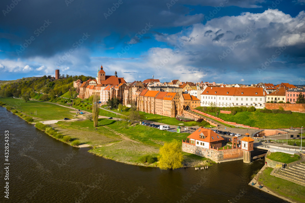 Grudziądz city over the Vistula River in the afternoon sun. Poland