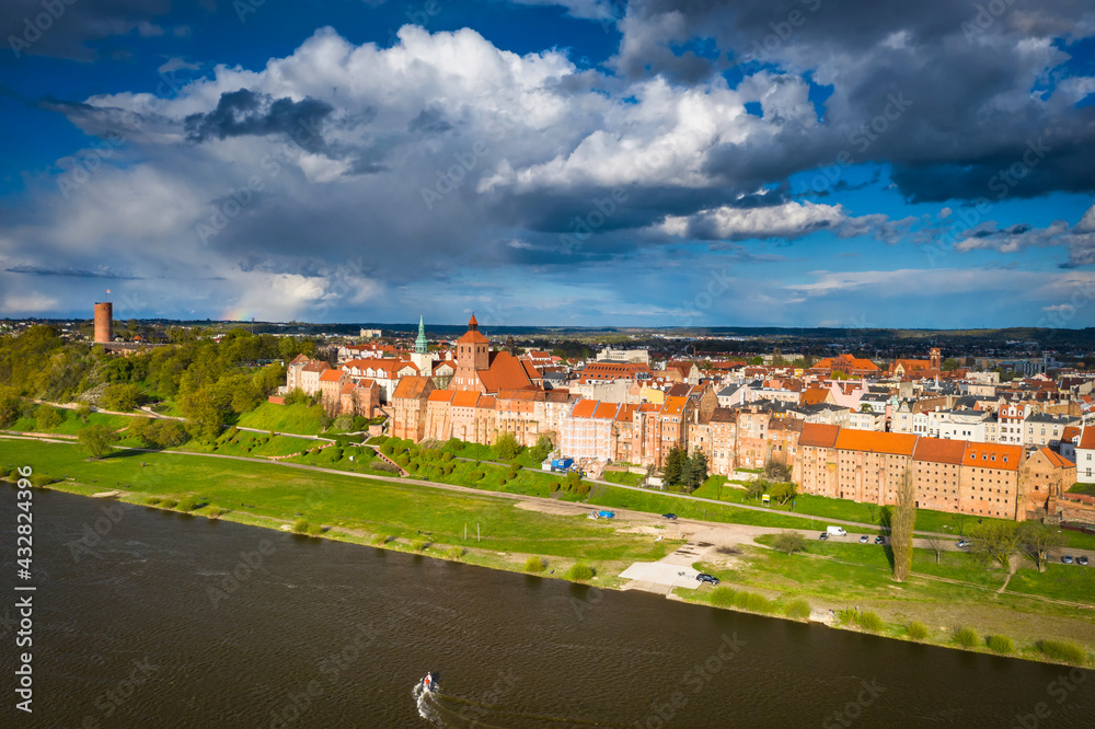 Grudziądz city over the Vistula River in the afternoon sun. Poland