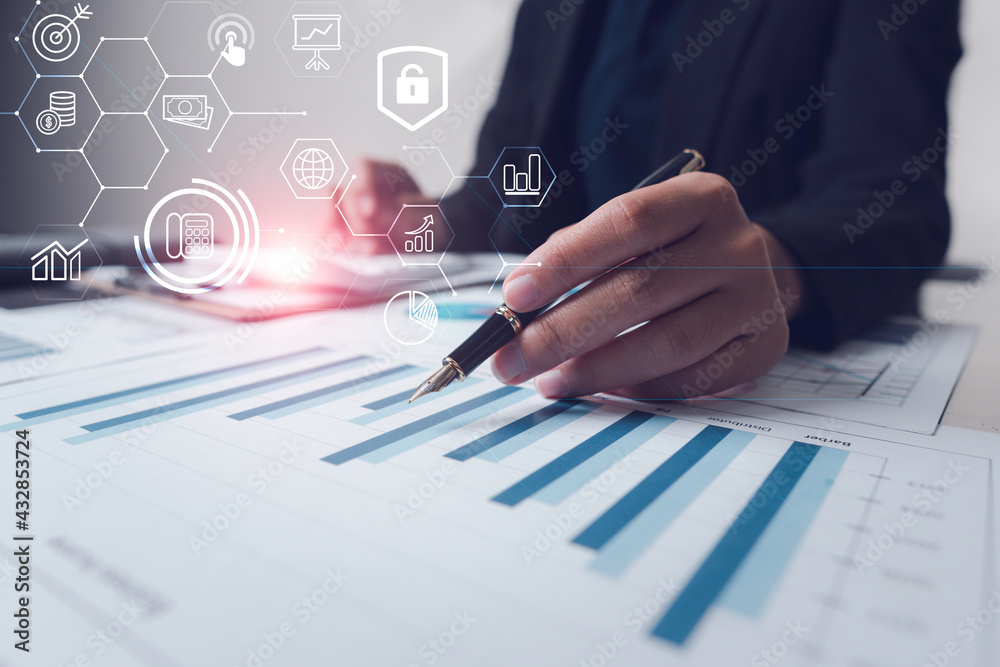 Business people analyze data graphs and graphs economic growth financial investment with hologram ch