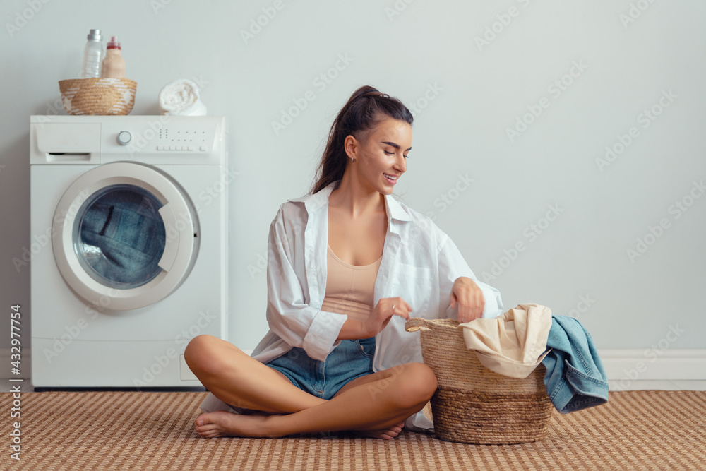 woman is doing laundry