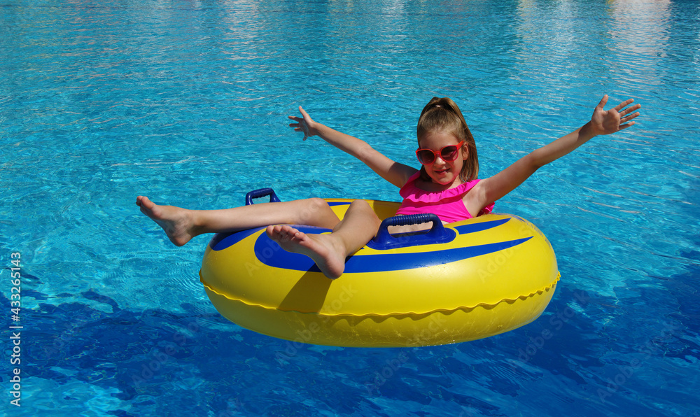 Little girl with inflatable ring