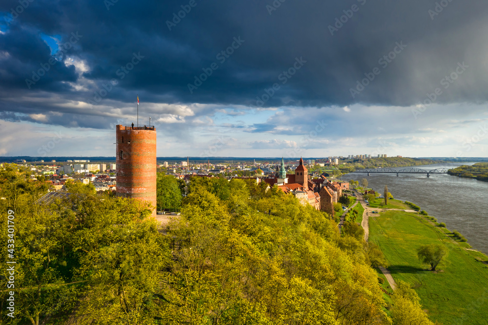 Klimek Tower in Grudziądz over the Vistula River in the afternoon sun. Poland