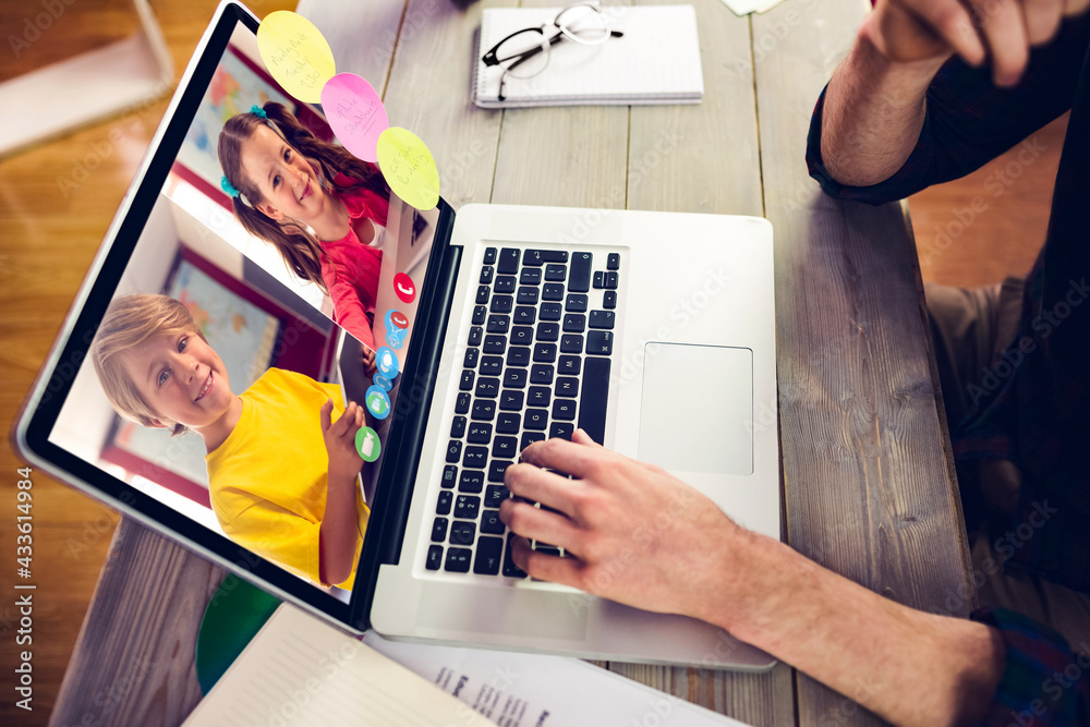 Caucasian businessman sitting at desk using laptop having video call