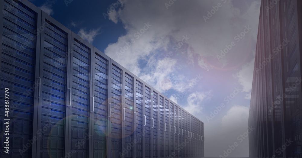 Multiple computer servers over blue sky background, data processing and technology concepts