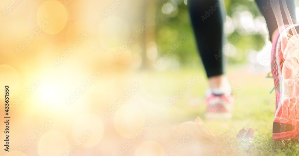 Leg with visible bones of woman running in sports shoes