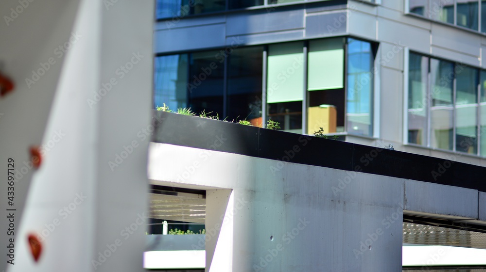 Glass and steel facade of the office building. Glass walls of a office building - business backgroun