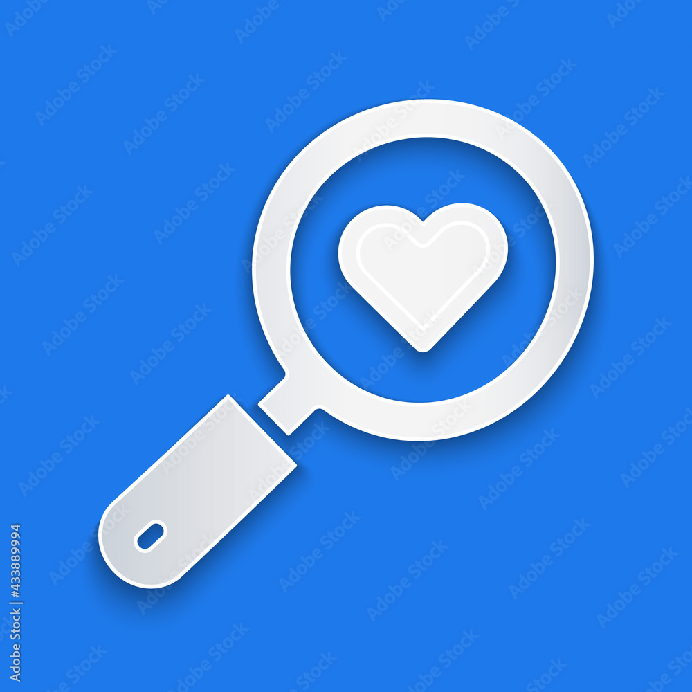 Paper cut Search heart and love icon isolated on blue background. Magnifying glass with heart inside