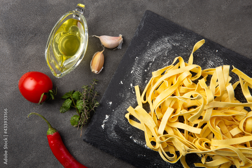 Italian pasta cooking process. Fresh food concept. Home made tagliatelle