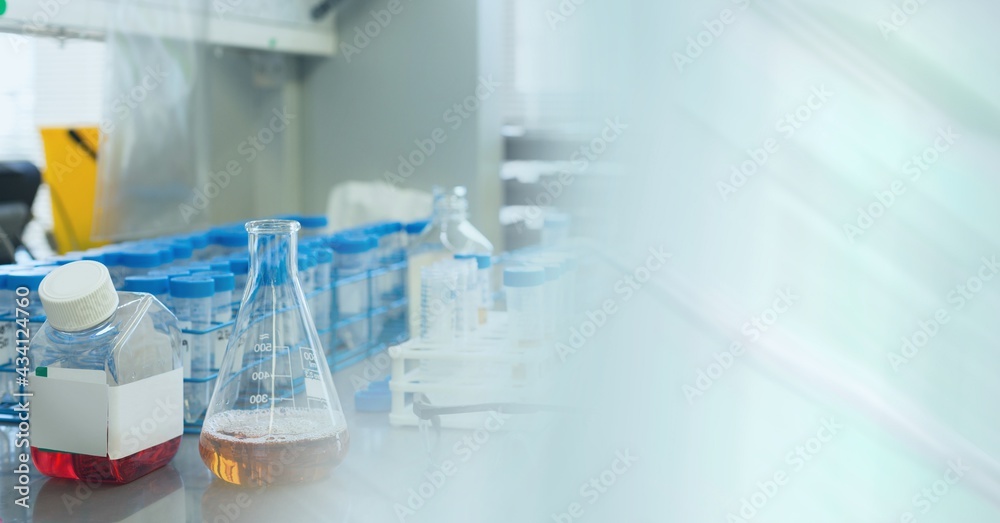 Composition of flasks and test tubes in lab with motion blur