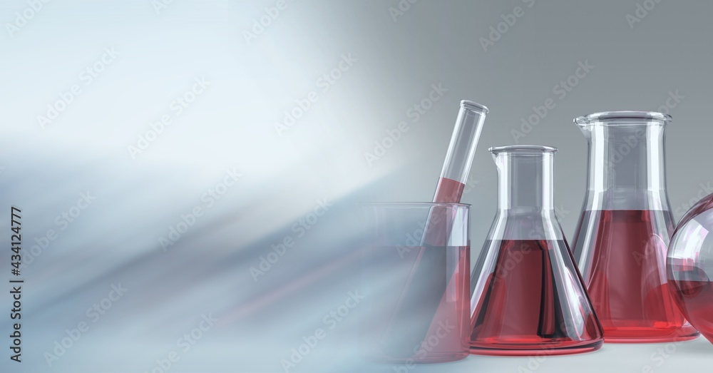 Composition of flasks and test tubes with fluid in lab with motion blur