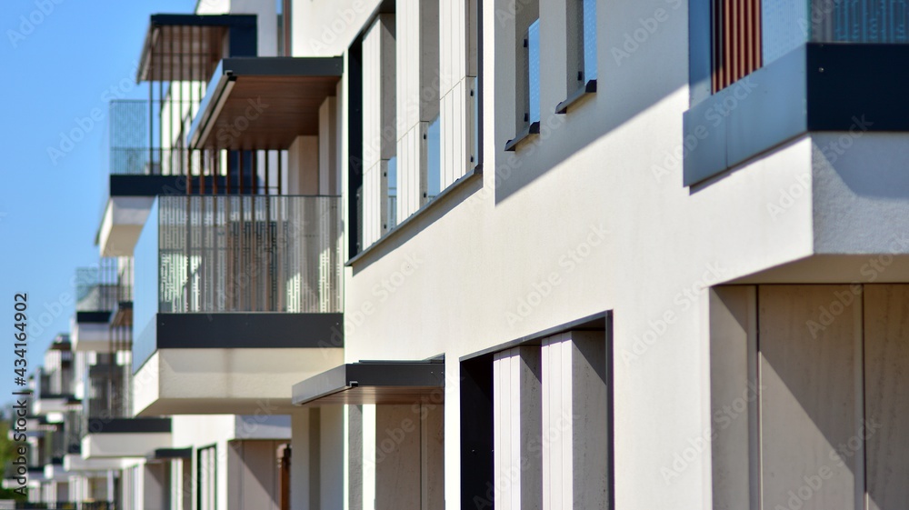 Condominium and apartment building with  symmetrical modern architecture. Detail in modern residenti