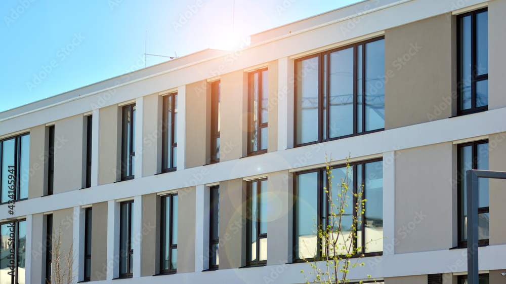 Apartment residential house and home facade architecture and outdoor facilities. Blue sky on the bac