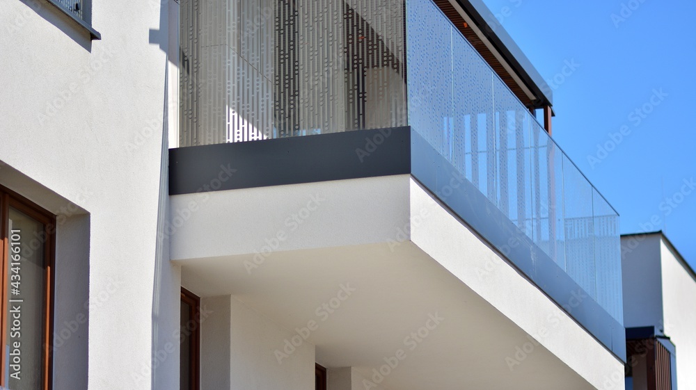 Condominium and apartment building with  symmetrical modern architecture. Detail in modern residenti