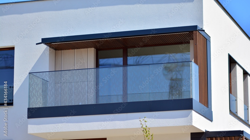 Condominium and apartment building with  symmetrical modern architecture. Detail in modern residenti