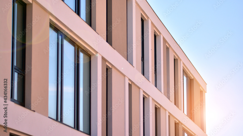 Apartment residential house and home facade architecture and outdoor facilities. Blue sky on the bac