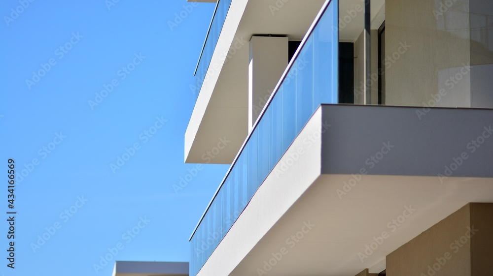 Condominium and apartment building with  symmetrical modern architecture. Detail in modern residenti