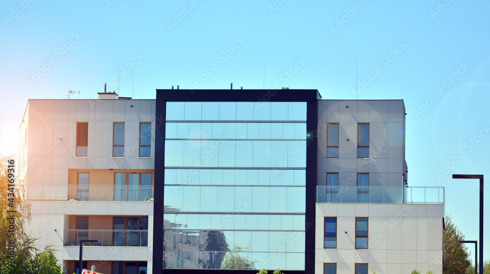 Apartment residential house and home facade architecture and outdoor facilities. Blue sky on the bac