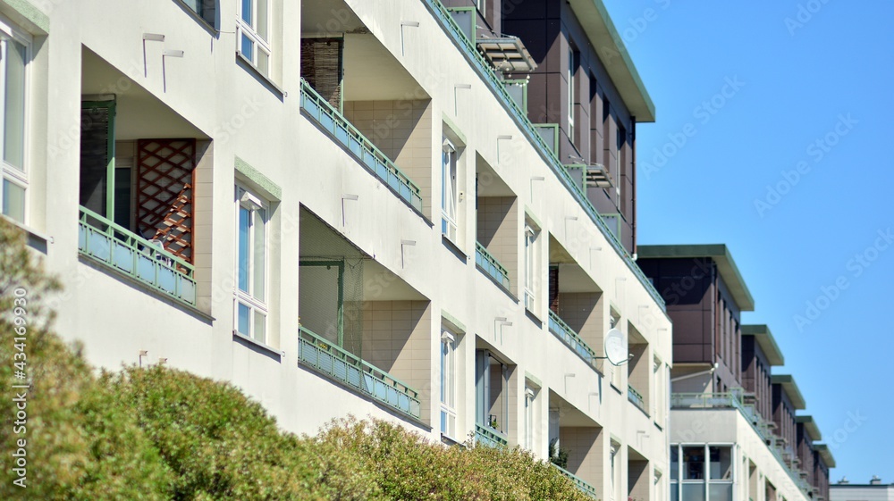 Condominium and apartment building with  symmetrical modern architecture. Detail in modern residenti