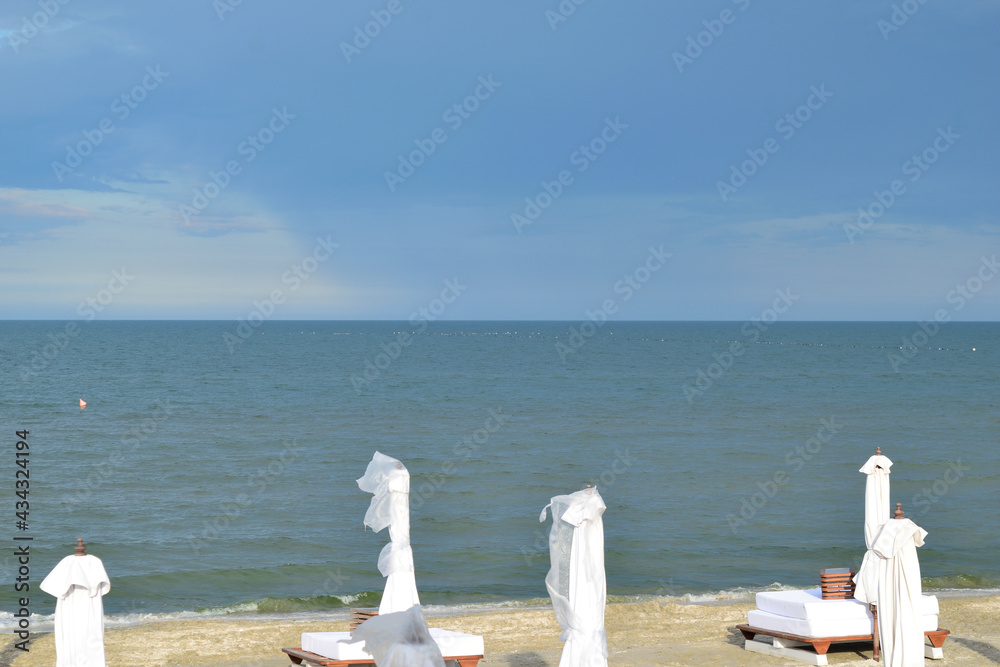 empty beach chairs and umbrellas after opening time (in the evening) - Navodari, Constanta, Dobrudja