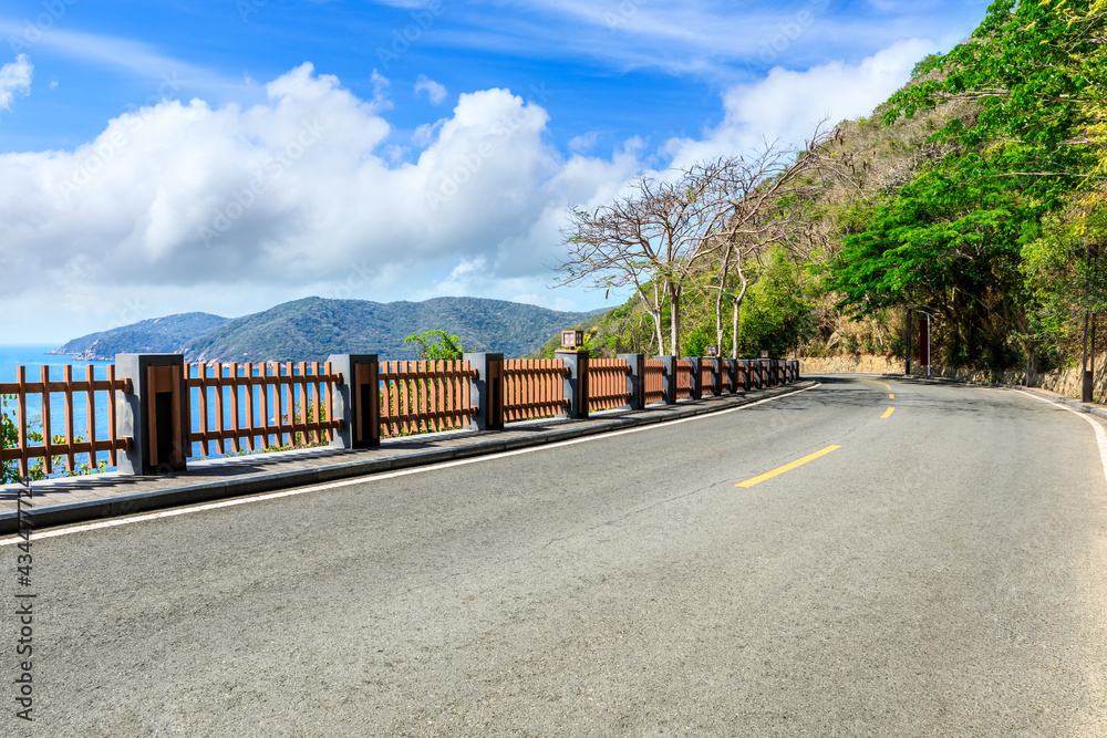 Asphalt highway go aside the bay of ocean.