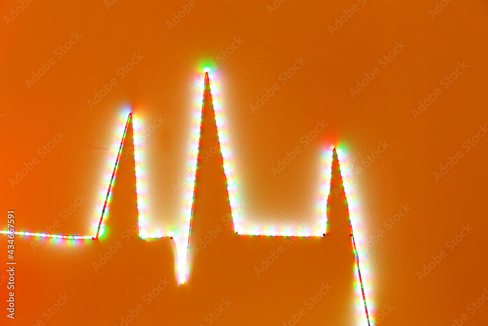 Bright neon garland on color background