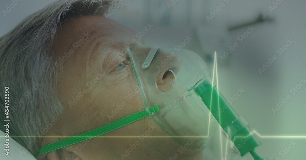 Heart rate over a senior man in an oxygen mask, healthcare concept