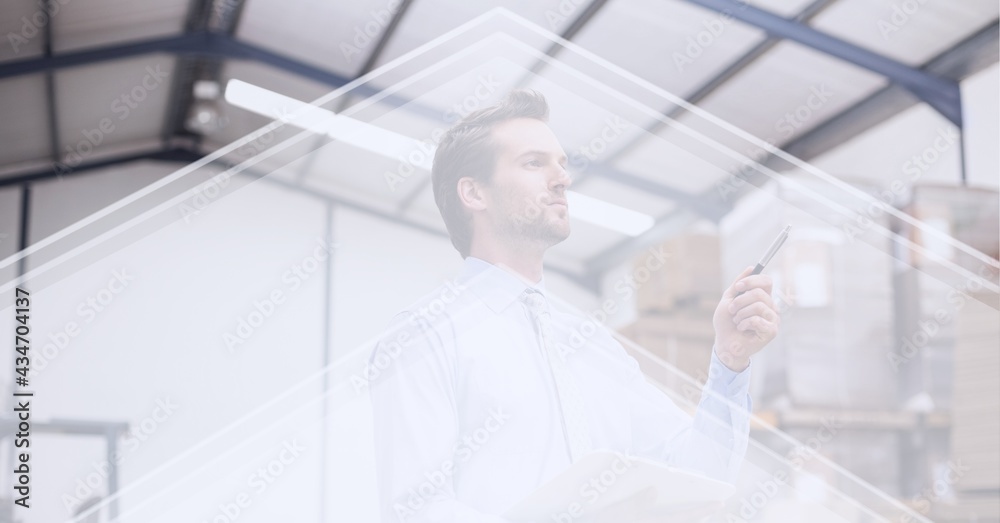 White abstract geometrical shapes over caucasian supervisor checking stock in warehouse