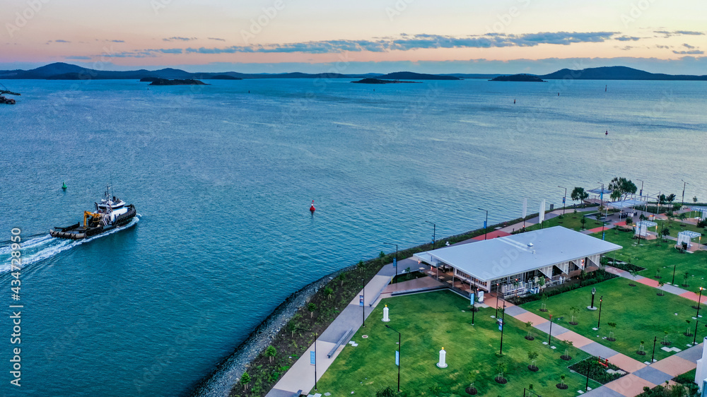 Fishing boat passing Eastshores precinct, Gladstone, Queensland