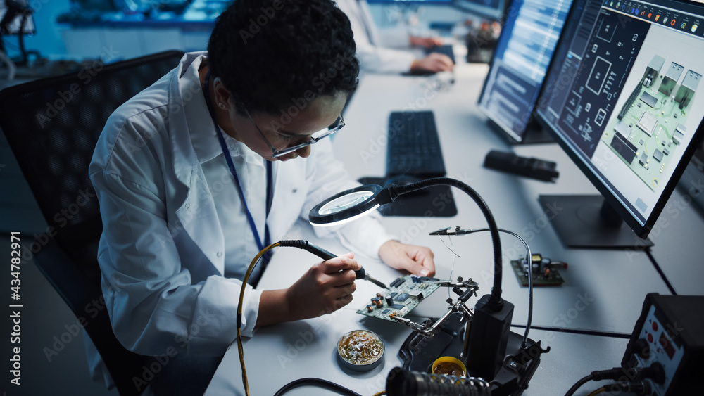 Modern Electronics Research, Development Facility: Black Female Engineer Does Computer Motherboard S