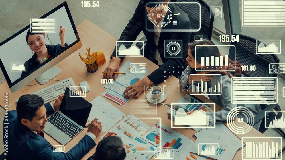 Creative visual of business people in a corporate staff meeting on video call . Concept of digital t