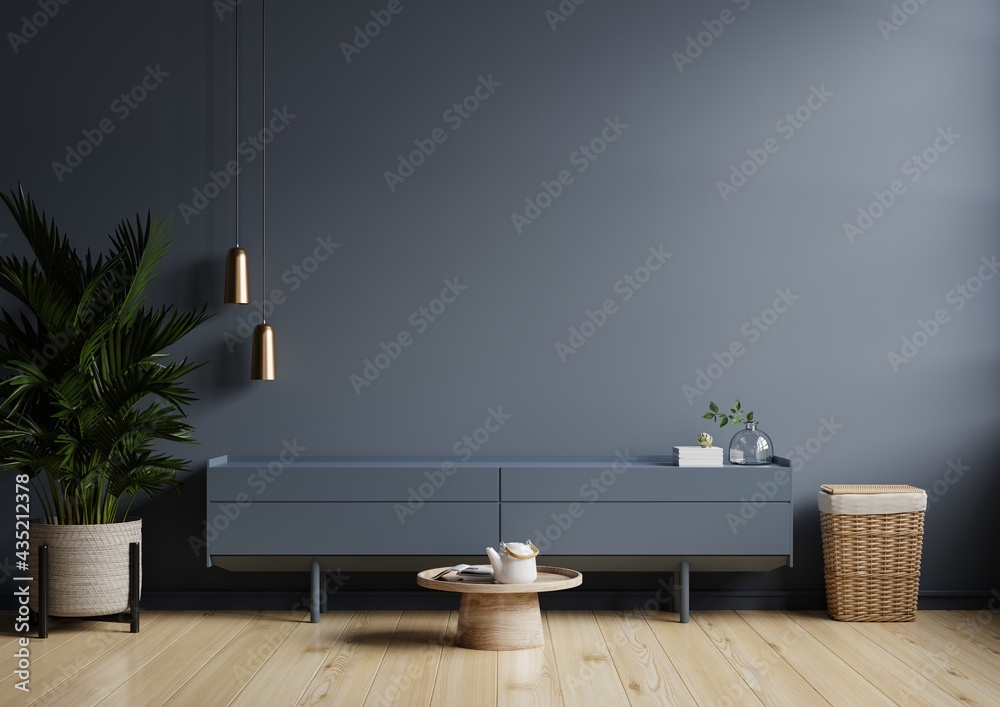 Modern interior of living room with cabinet for tv on dark blue wall background.