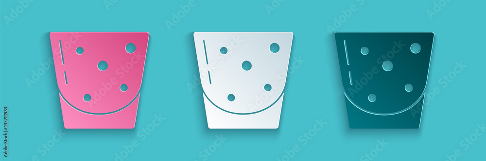 Paper cut Glass of rum icon isolated on blue background. Paper art style. Vector