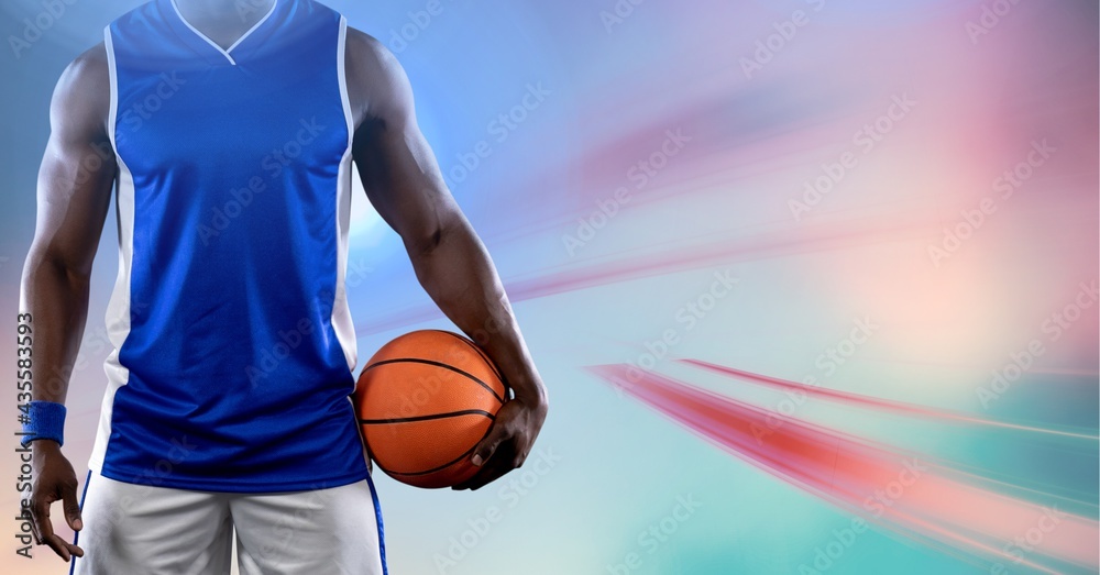 Composition of midsection of basketball player holding ball with copy space