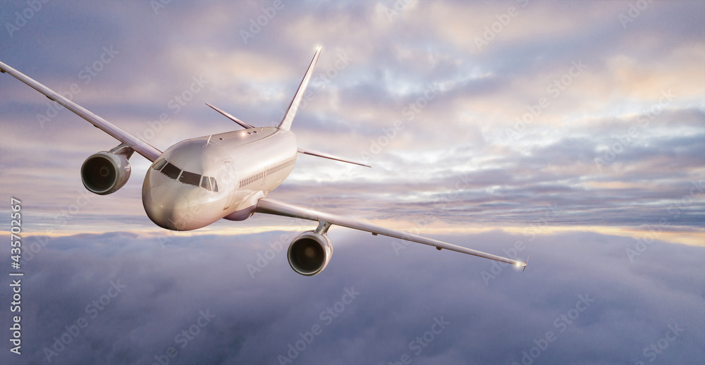 Passengers commercial airplane flying above clouds