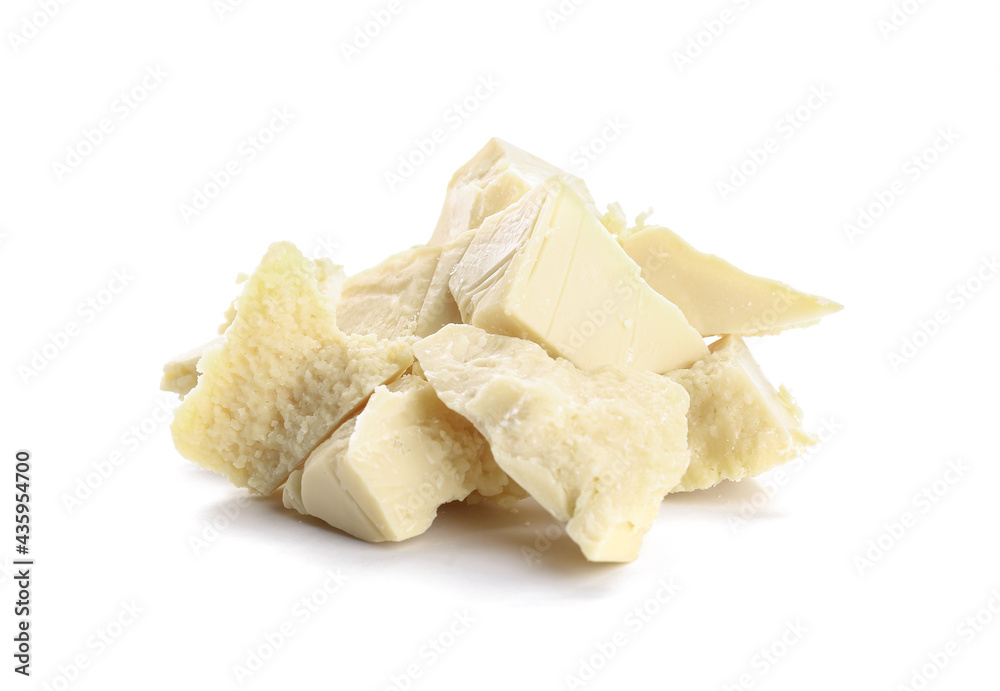 Pieces of cocoa butter on white background