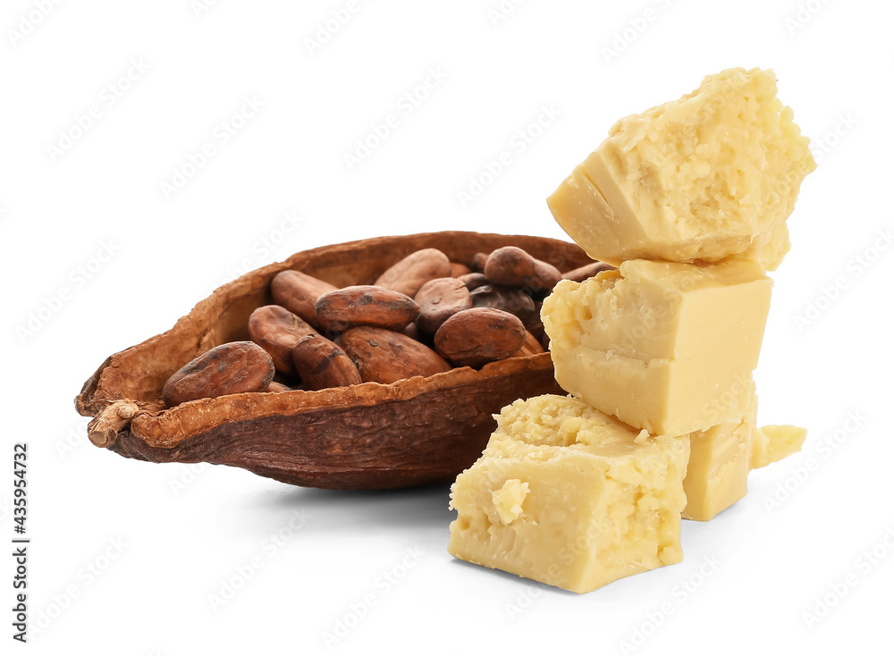 Cocoa butter and beans on white background