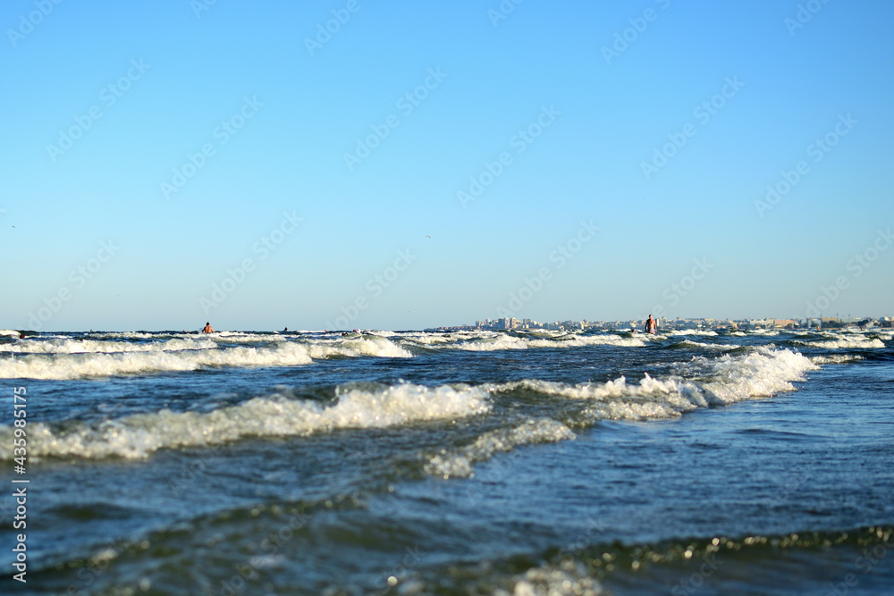 summer view of the sea with good waves from the beach - seascape, landscape - Navodari, Constanta co