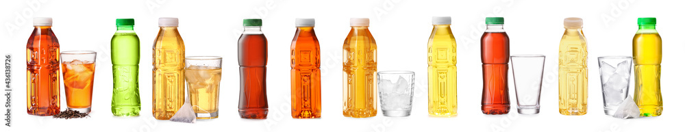 Bottles of tasty cold tea on white background