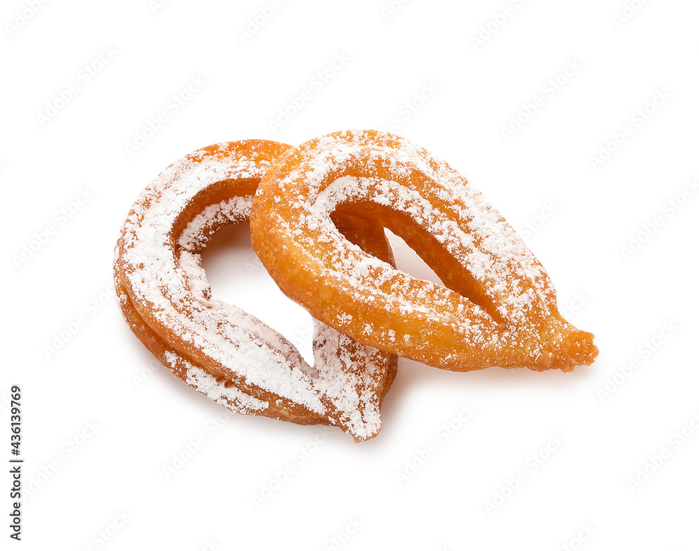 Tasty churros on white background